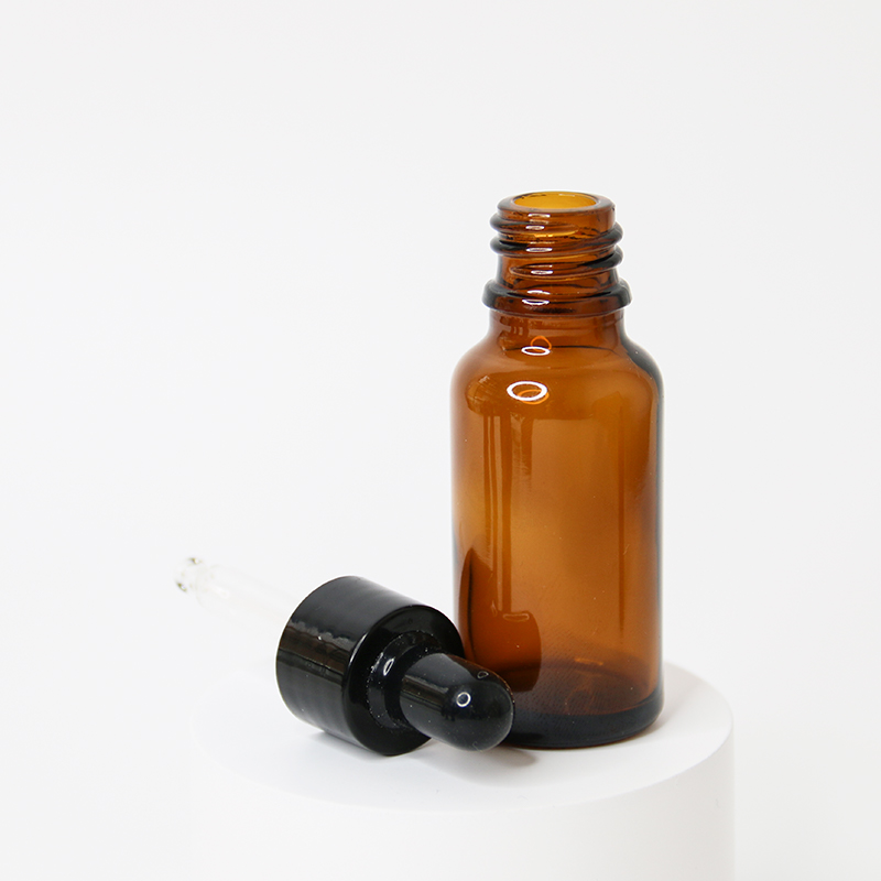 an open opaque glass bottle packaging for serums with medicine dropper closure 01